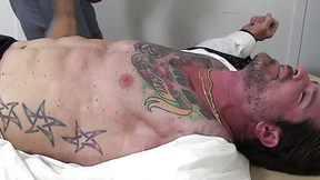 Tatted muscular hunk endures tickling torture from master