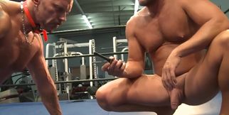 Muscular DILFs share moments of rough sexuality in the ring
