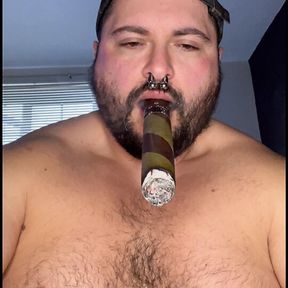 Flexing muscle Bull cigar and big load at the end