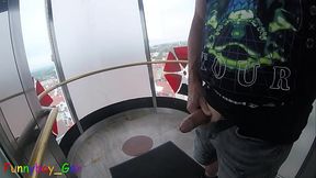 I jerk my cock very riskily in a public, transparent outdoor elevator on the 13th floor. (S)
