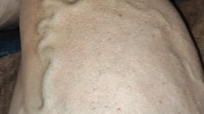 Up close flexing while watching tv