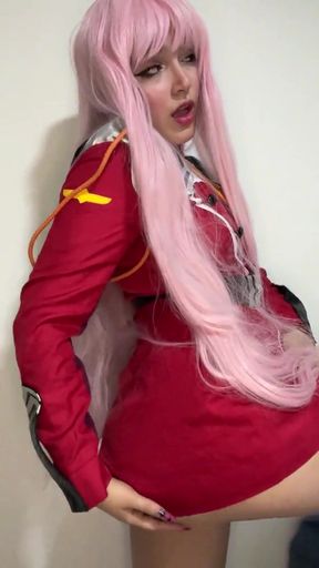 Cosplaying anime lass dons a school uni & gets off on her own