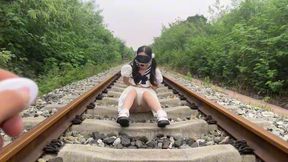 FX86-Asian girl, outdoor games, tied to train tracks, finally reaches orgasm in a car.