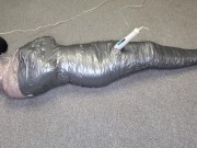 Harley Quinn wrapped in layers of mummification bondage then teased with a wand & made to cum