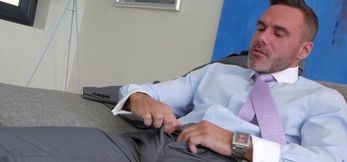 Threeway with a bodybuilder and two males in a suit