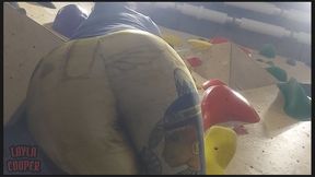 Giantess Layla climbs in golden leggings