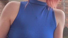 Smoking in a revealing outfit