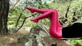 Rose spandex pantyhose on a hammock in the mountains