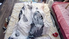 Sensual massage of a hot couple with oil on the body.