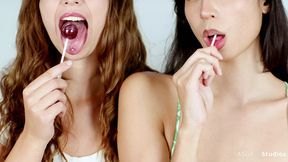 Sexy Cutie Plays with Lollipops