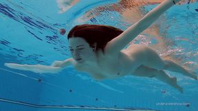 Hot brunette Russian girl Katy Soroka enjoys swimming