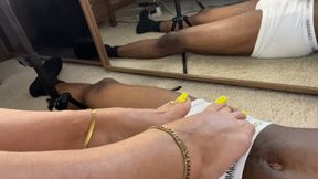 Bright yellow toes playing on his BBC