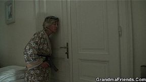Blonde mature sucks two young cocks