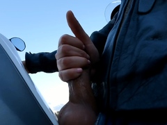 Risky handjob outdoors on the motorbike - cumshot