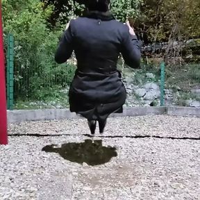 Step mom in stocking and coat swings on the swing and shows the buttplug in her ass