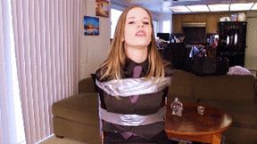 Catie Parker, a sitter gets tightly taped up and wraparound tape gagged during a game (FULL 1080 HD)