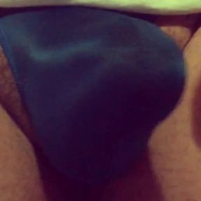 Playing with my bulge in a tiny blue man thong