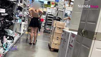 Blonde bombshell NandaNua spreads legs at Mall &mdash;  blows skirt &mdash;  flaunting thong and all &mdash;  as she shops for sex