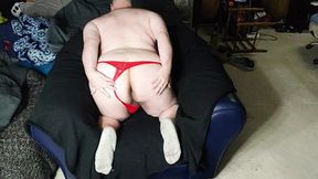 Chubby guy jerks off wearing lace thong