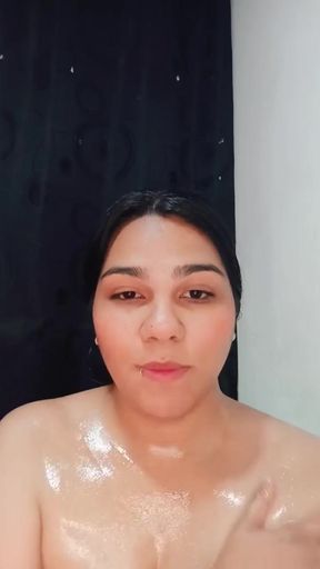 Sensual Brunette Puts Oil All Over Her Body