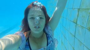 Bubbles, swimming, sinking underwater with dress, red hair