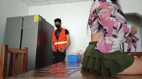 Cinderella shakes her buttocks on the table while the maintenance technician repairs the refrigerator