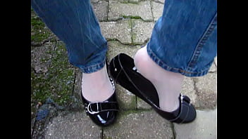 outdoor shoeplay by Isabelle-Sandrine, black patent ballet flats, jeans and nylons