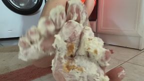 Messy barefoot cake trample in denim shorts