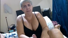 Mature Wife Masturbates Her Husband in Close-up