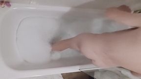 Boy soaks wet in tub flexing flaccid for cam hungry eyes