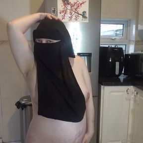 Dancing fully nude in Niqab