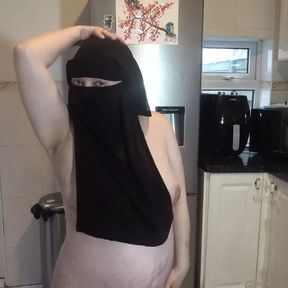 Dancing fully nude in Niqab