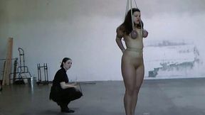 Sweet white girl with big boobs is exposed to bondage