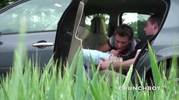 he suck his friend outdoor in the car
