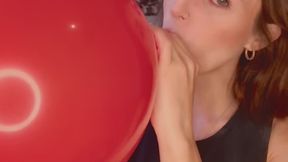 Empress Scarlett Blows up and big red balloon