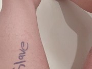 Trans boy rubbing and pissing in the bathtub