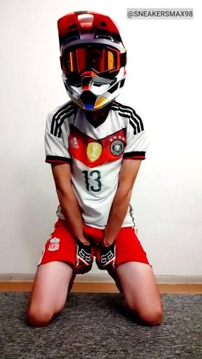 Young Gay in Soccer Uniform and Helmet Jerks off on Camera