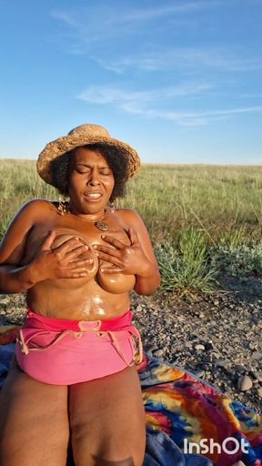 DRONE CATCHES  BLACK BBW MASSAGING HER BODY IN NATURE
