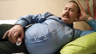 Watch this humongous Moustached Father give a hot homemade handjob to a small cock