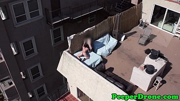 Drone films rooftop sex