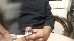 Cum with toothbrush
