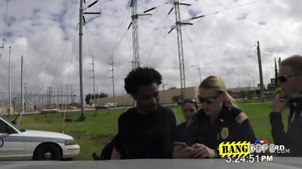 Hardcore sex on the rooftop between two big titty MILFs and a black thief.