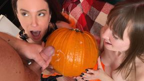 Two slampigs, Kate and Mary, gangbang each other's gapes on Halloween.