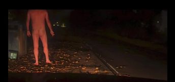 Hiding from passing cars whilst naked in public