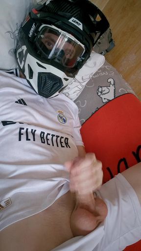The Guy Is Wearing a Soccer Uniform and Mxhelmet with a Morning Cum
