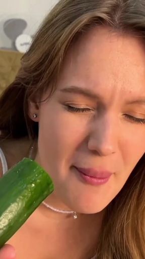 Woman holding a pickle