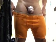 CHANGING IN THE LOCKER ROOM SHOWING MY COCK CAGE