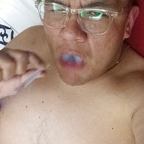 Chubby bator mexican smoking and playing in hotel