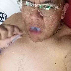 Chubby bator mexican smoking and playing in hotel