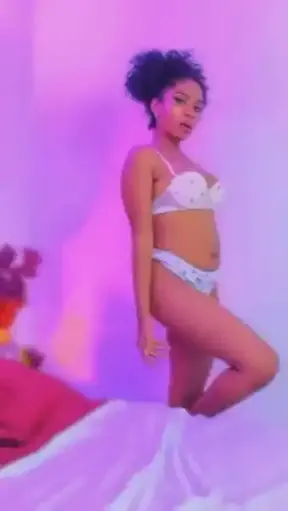 Seductive movements and enticing allure in this captivating performance.
